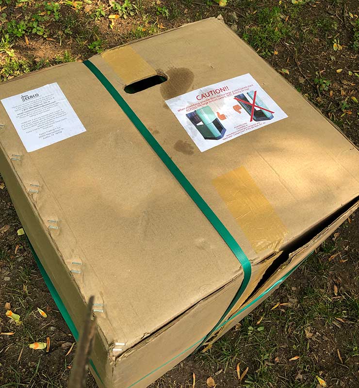 Large cardboard box containing the Aerobin Composter pieces